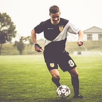 Soccer player in customised soccer jersey from owayo