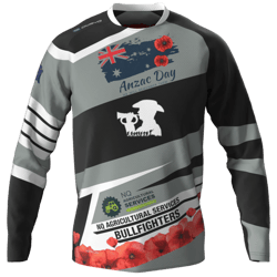 Trikot A jersey with the inscription 'Anzac Day' and the logo of 'NQ Agricultural Services Bullfighters'. The jersey is designed in gray, black, and white colors. It also features an Australian flag and red flowers.