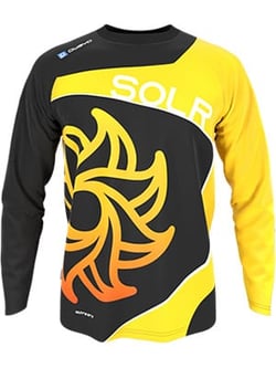 A black and yellow motocross jersey with a stylized sun design on the front.