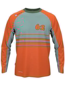An orange and green motocross jersey with the number 62 on it.