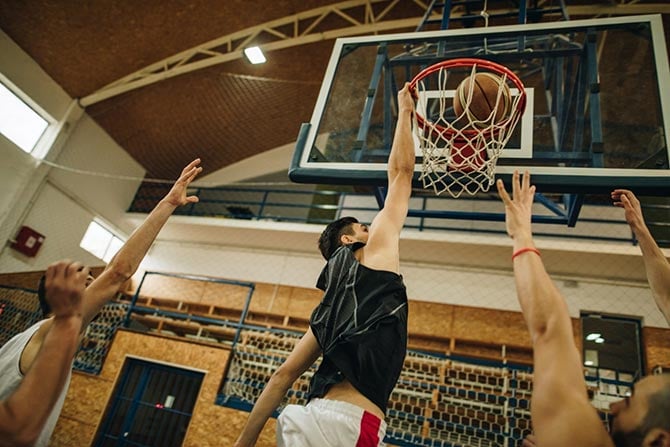 Basketball player doing a slam dunk