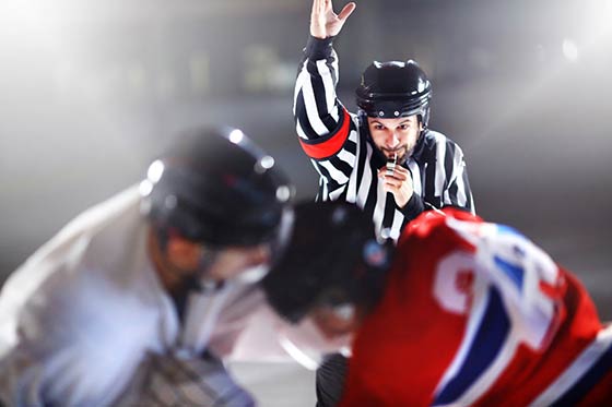 What is cross checking in Hockey? (What the Rules say)