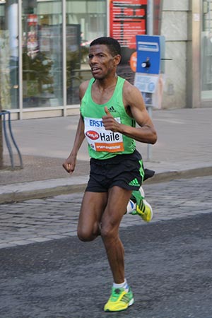 Long Distance runner Haile Gebrselassie using his new running technique